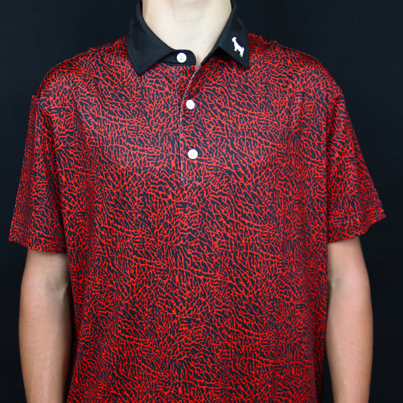 THE RED/BLACK CEMENT YOUTH POLO